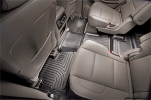 Rear car seats with molded rubber floor mats