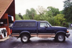 1992-1996 Ford F150 with an A.R.E. mid rise camper shell