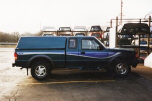 Ford Ranger with a solid side camper shell
